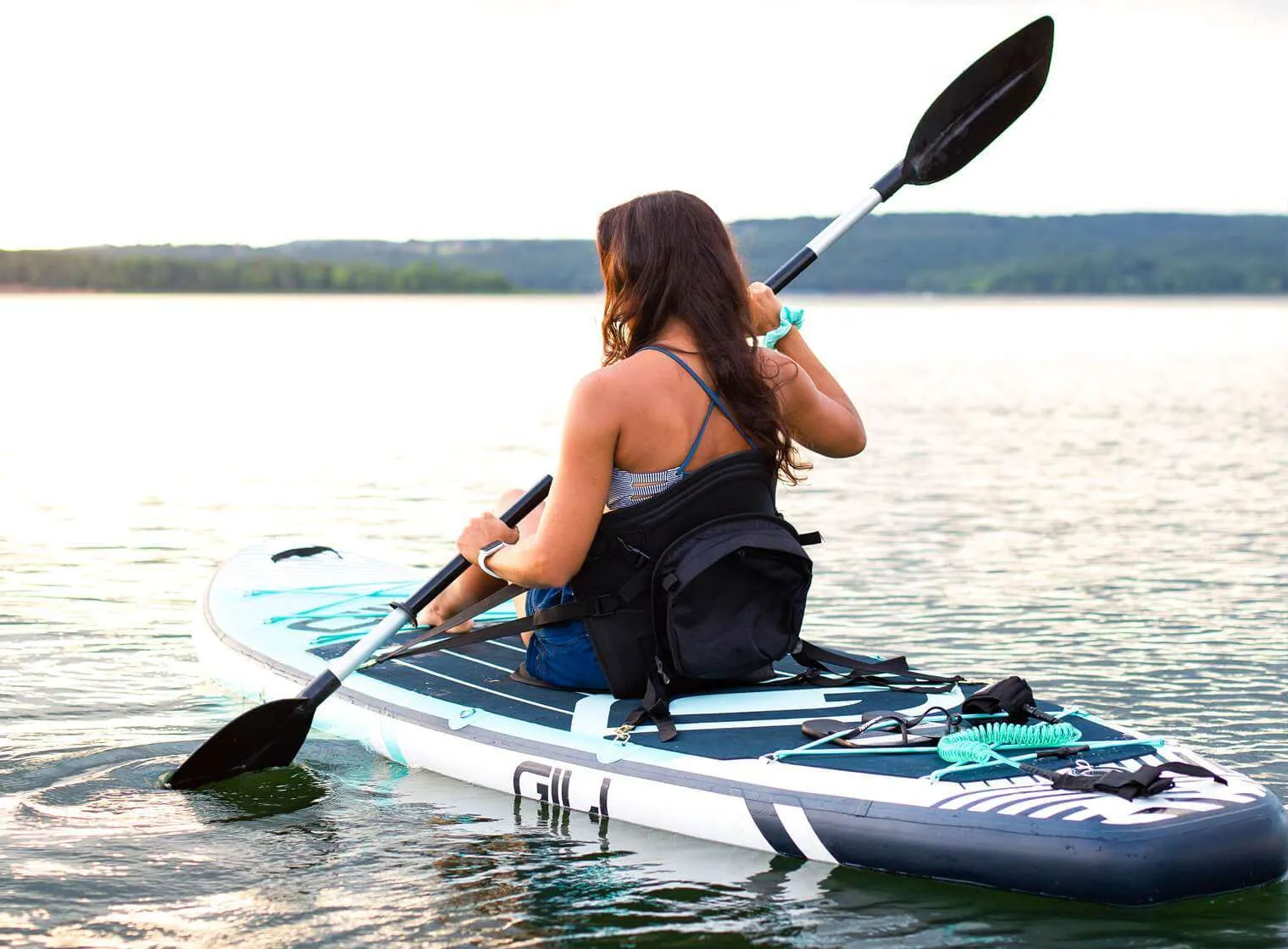 Paddle board set up with a kayak seat