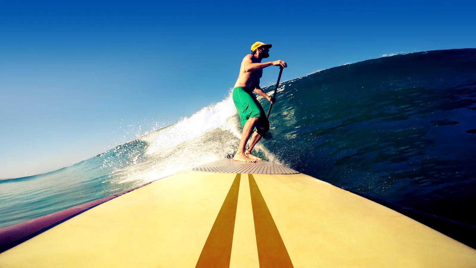 Paddle boarding in waves